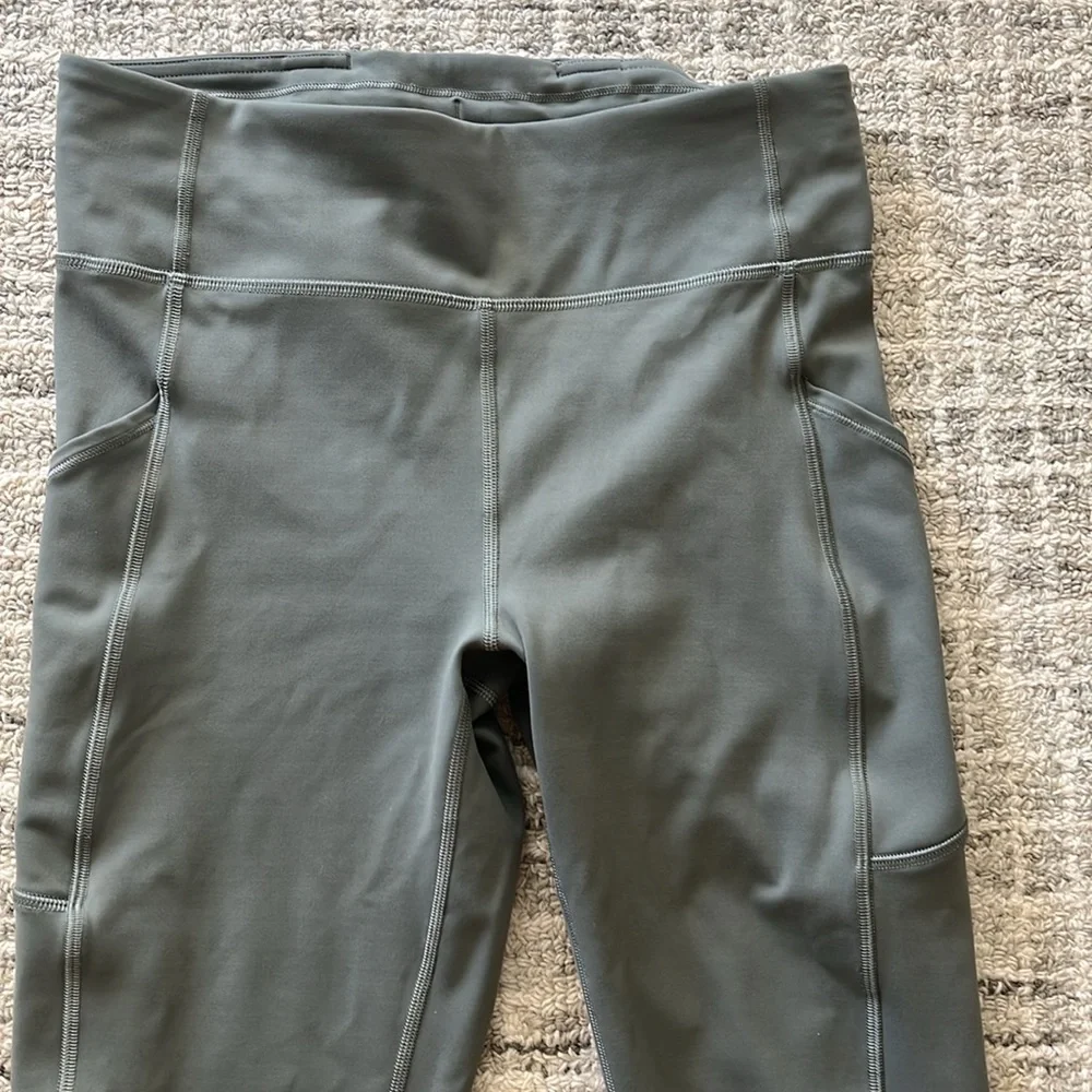 Lululemon invigorate high rise leggings. Grey sage, Size 8,23”